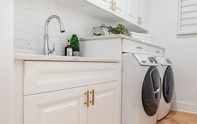 Dream White laundry cabinets.