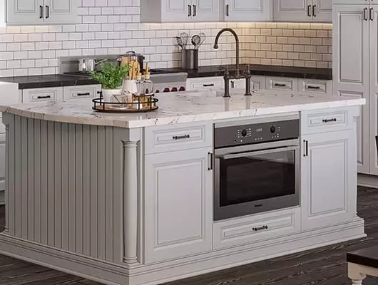 Sink and oven in kitchen island.