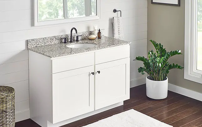 Lexington White Shaker single-sink vanity cabinet.