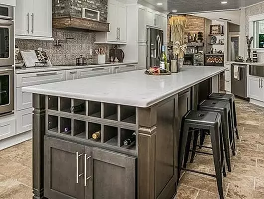 Rustic kitchen island with a built in wine rack.