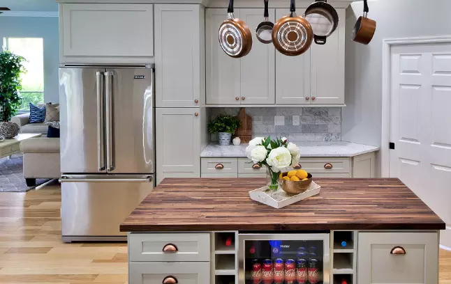 Dove Shaker double-door pantry cabinets.