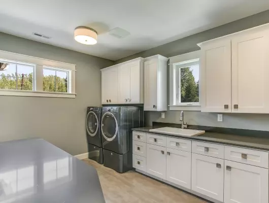 white-shaker-cabinets-in-laundry-room